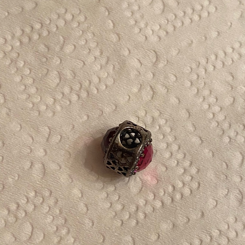 Elegant Silver and Red Filigree Charm